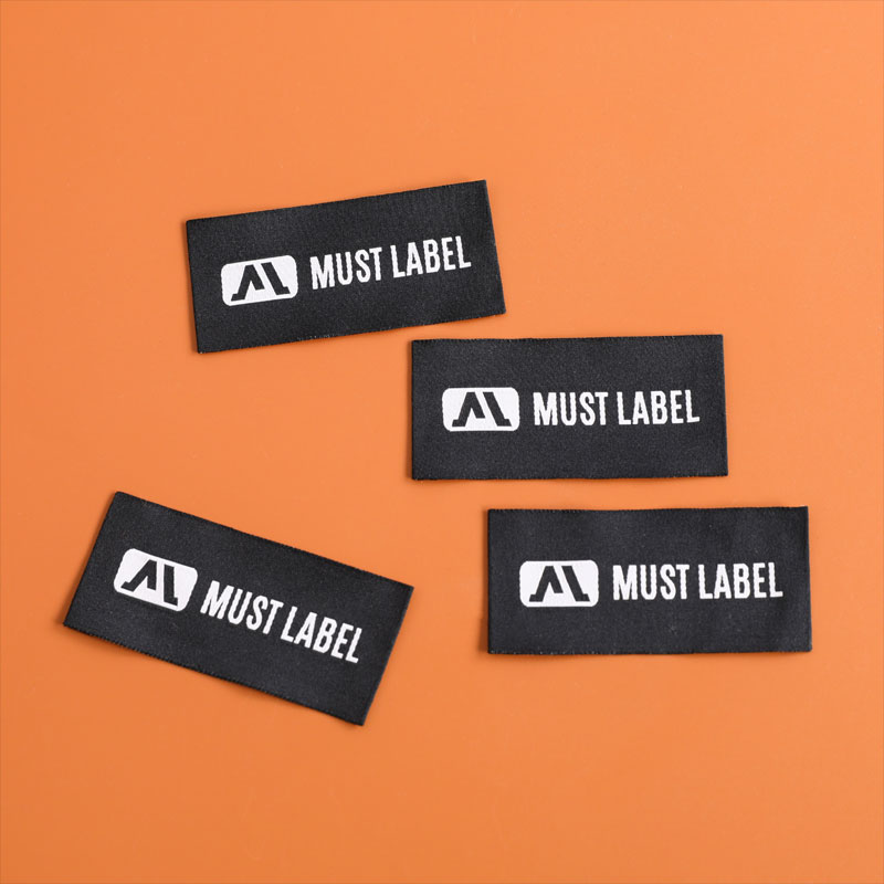 Wat zijn geweven labels?